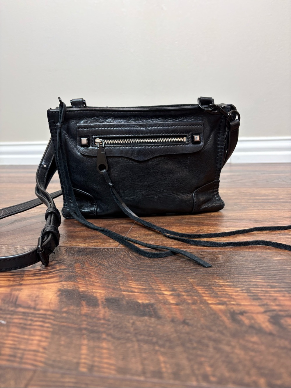 Rebecca Minkoff Black Leather Mini Crossbody with Front Zip Tassel Detail